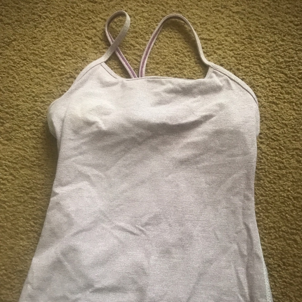 Luluemon top with built in bra but not pads.